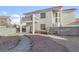 Large backyard featuring a covered patio, offering space for outdoor activities at 3632 Julia Waldene Ct, Las Vegas, NV 89129
