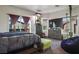 Comfortable bedroom with large windows, wood furniture and soft carpet at 3632 Julia Waldene Ct, Las Vegas, NV 89129