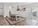 Open-concept living area with lots of natural light and wood flooring at 3632 Julia Waldene Ct, Las Vegas, NV 89129