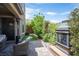 Beautiful backyard landscape with artificial turf, stone accents and lush greenery at 3698 Regatta Landing Dr, Las Vegas, NV 89141