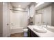 Bright bathroom features a tub and shower combination and single sink vanity at 3698 Regatta Landing Dr, Las Vegas, NV 89141