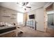 bedroom with a bed and slide, a ceiling fan, storage, and a large window at 3698 Regatta Landing Dr, Las Vegas, NV 89141
