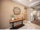 Welcoming entryway featuring stylish console table, modern lighting, and marble flooring at 3698 Regatta Landing Dr, Las Vegas, NV 89141