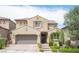 Charming two-story home features desert landscaping and a tiled roof at 3698 Regatta Landing Dr, Las Vegas, NV 89141
