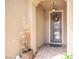 Stylish front door with glass panels and decorative wreath for added charm at 3698 Regatta Landing Dr, Las Vegas, NV 89141
