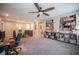 Spacious loft with recessed lights, shelving, and comfortable seating, perfect for reading or relaxing at 3698 Regatta Landing Dr, Las Vegas, NV 89141