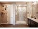 Main bathroom boasts a walk-in shower with glass enclosure, modern fixtures, and tile surround at 3698 Regatta Landing Dr, Las Vegas, NV 89141