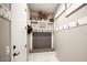 Mudroom with a seating area, hooks for hanging items, and storage shelves at 3698 Regatta Landing Dr, Las Vegas, NV 89141