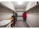 Spacious walk-in closet features shelving, hanging rods, and ample storage space for clothes and accessories at 3698 Regatta Landing Dr, Las Vegas, NV 89141