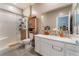 Bathroom featuring a glass door shower, a large mirror, and an oversized vanity with a sink at 3746 Asia Rd, North Las Vegas, NV 89032