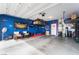 Spacious garage with ample storage and decorative wall art at 3746 Asia Rd, North Las Vegas, NV 89032