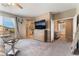 Bright main bedroom boasting a plush bed, sliding glass doors to balcony, ensuite bathroom and walk-in closet at 3746 Asia Rd, North Las Vegas, NV 89032
