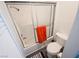 Bathroom with shower over tub, toilet and black vanity with granite counter at 3771 Desert Marina Dr # 95, Laughlin, NV 89029