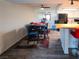 Bright dining area with laminate floors, a ceiling fan, and a view to the kitchen at 3771 Desert Marina Dr # 95, Laughlin, NV 89029