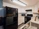 Efficient kitchen with stainless-steel appliances, white cabinets, and ample counter space at 3771 Desert Marina Dr # 95, Laughlin, NV 89029