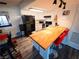 Well lit kitchen features a butcher block countertop, modern appliances, and seating at the counter at 3771 Desert Marina Dr # 95, Laughlin, NV 89029