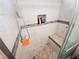 Modern shower features tiled walls, stone floor, a built in bench, and tiled accent stripe at 3771 Desert Marina Dr # 95, Laughlin, NV 89029