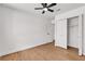 Clean bedroom with wood-look floors and large closets at 405 Oil Lantern Ln, Las Vegas, NV 89145