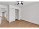 Bedroom features wood-look floors and closet at 405 Oil Lantern Ln, Las Vegas, NV 89145