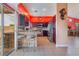 Well-appointed kitchen with stainless steel appliances, granite countertops, and bar seating at 4110 Bonita Desert Ct, North Las Vegas, NV 89032