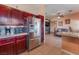 Modern kitchen with stainless steel appliances and eat-in bar at 4110 Bonita Desert Ct, North Las Vegas, NV 89032