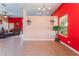 Open-concept living area with tile flooring and two-tone wall paint at 4110 Bonita Desert Ct, North Las Vegas, NV 89032