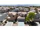 An aerial view showcases a neighborhood with well-maintained homes and landscaping at 4149 Dignified Ct, North Las Vegas, NV 89032