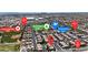 Aerial view of a neighborhood close to parks, community pool, and school at 4149 Dignified Ct, North Las Vegas, NV 89032