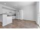 Inviting kitchen area with white cabinets, granite countertops and natural light at 4149 Dignified Ct, North Las Vegas, NV 89032