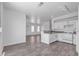 Open-concept living area featuring hardwood flooring and a breakfast bar at 4149 Dignified Ct, North Las Vegas, NV 89032