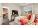 Comfortable bedroom with neutral color scheme and view into a connecting bedroom at 419 Vigo Port St, Las Vegas, NV 89138