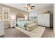 Cozy bedroom with a tufted headboard bed, soft lighting, and neutral tones at 419 Vigo Port St, Las Vegas, NV 89138