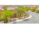 Attractive two-story home with landscaped front yard and attached garage in a residential neighborhood at 419 Vigo Port St, Las Vegas, NV 89138