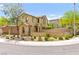 Charming two-story home boasts a well-manicured front yard with desert landscaping and a private, gated courtyard entry at 419 Vigo Port St, Las Vegas, NV 89138