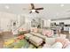 Inviting living room with an open floor plan, seamlessly connected to the dining area and kitchen at 419 Vigo Port St, Las Vegas, NV 89138