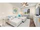 Open living room with stylish decor, recessed lighting, and large windows with bright natural light at 419 Vigo Port St, Las Vegas, NV 89138