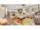 Inviting living room open to the kitchen, with a floral rug and comfortable seating at 419 Vigo Port St, Las Vegas, NV 89138