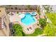 Aerial view of a backyard oasis with a uniquely shaped pool and jacuzzi at 419 Vigo Port St, Las Vegas, NV 89138