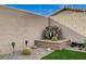 Well-maintained backyard corner with decorative rock, artificial turf, and desert plant landscaping at 468 Harvest Rain, Las Vegas, NV 89011