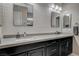 Bathroom features a dual vanity with a bright countertop and modern cabinets and lighting at 468 Harvest Rain, Las Vegas, NV 89011
