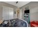 Bedroom features a ceiling fan, closet, and access to the hallway at 468 Harvest Rain, Las Vegas, NV 89011