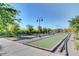 Community bocce ball courts are nestled among lush landscaping, offering residents an outdoor leisure space at 468 Harvest Rain, Las Vegas, NV 89011