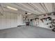 Garage features epoxy flooring and built-in storage cabinets at 468 Harvest Rain, Las Vegas, NV 89011
