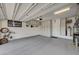 Garage featuring epoxy flooring and ample storage cabinets at 468 Harvest Rain, Las Vegas, NV 89011