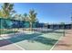 Community pickleball courts offer residents recreational opportunities with well-maintained green playing surfaces at 468 Harvest Rain, Las Vegas, NV 89011