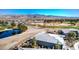 Aerial view showcasing the property layout, desert landscaping, and outdoor patio at 4924 E Cactus Canyon Dr, Pahrump, NV 89061