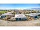 Aerial view showcasing desert community, beautiful landscaping and mountain views at 4924 E Cactus Canyon Dr, Pahrump, NV 89061