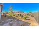 Gravel landscaping in the fenced backyard offers low maintenance and desert charm at 4924 E Cactus Canyon Dr, Pahrump, NV 89061