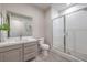 Modern bathroom featuring a glass shower, contemporary vanity, and decorative tile floor at 4924 E Cactus Canyon Dr, Pahrump, NV 89061