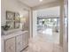 Welcoming entryway featuring a decorative console table, elegant mirrors, and marble flooring, creating a sophisticated first impression at 4924 E Cactus Canyon Dr, Pahrump, NV 89061